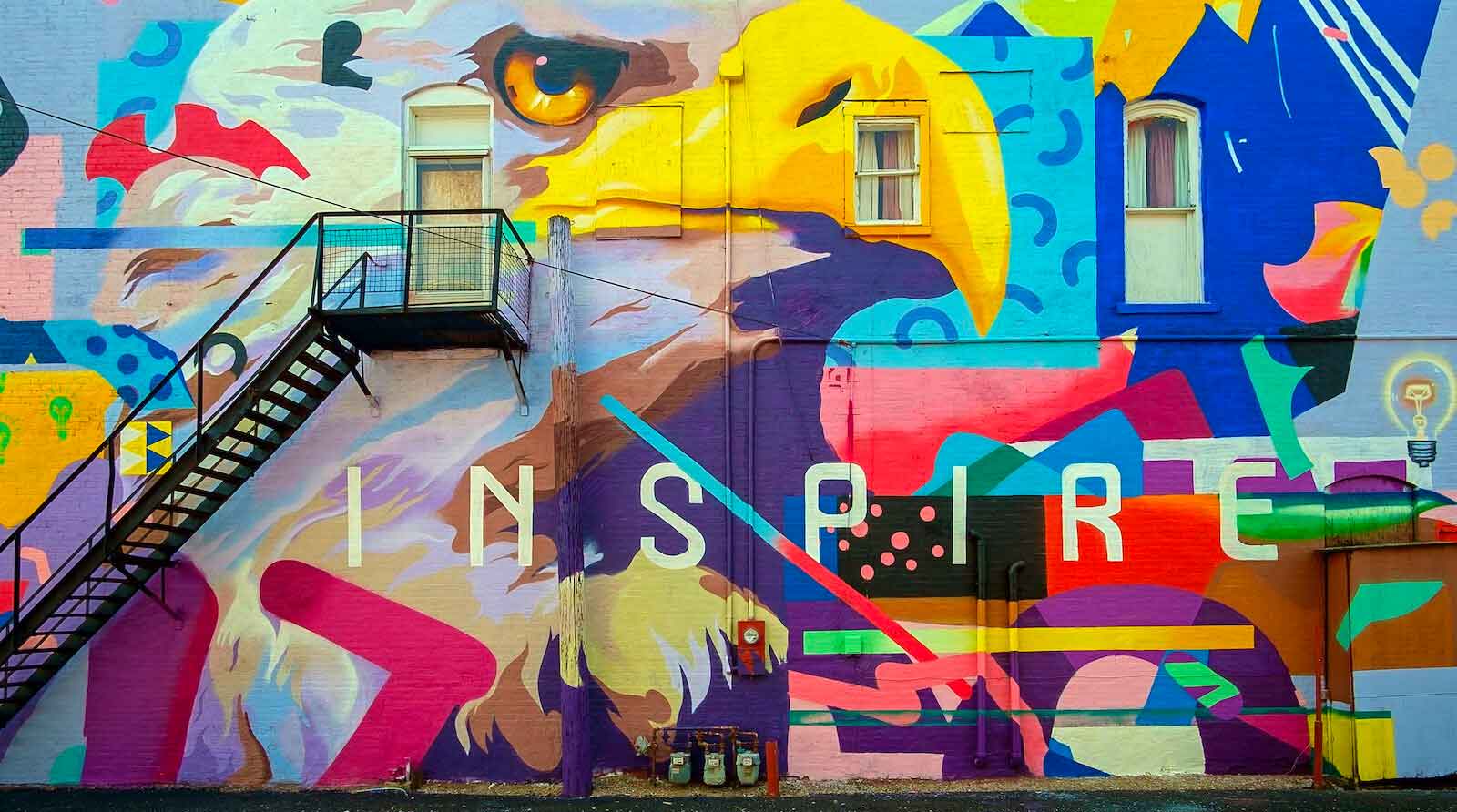 Inspire mural on building exterior